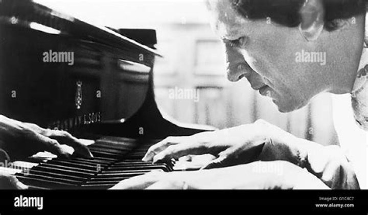 Can geoffrey rush play piano?