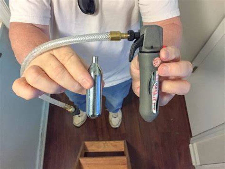 How to clear air conditioning drain line?