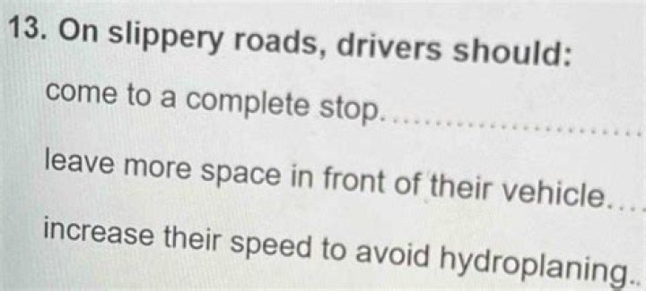 On slippery roads drivers should?