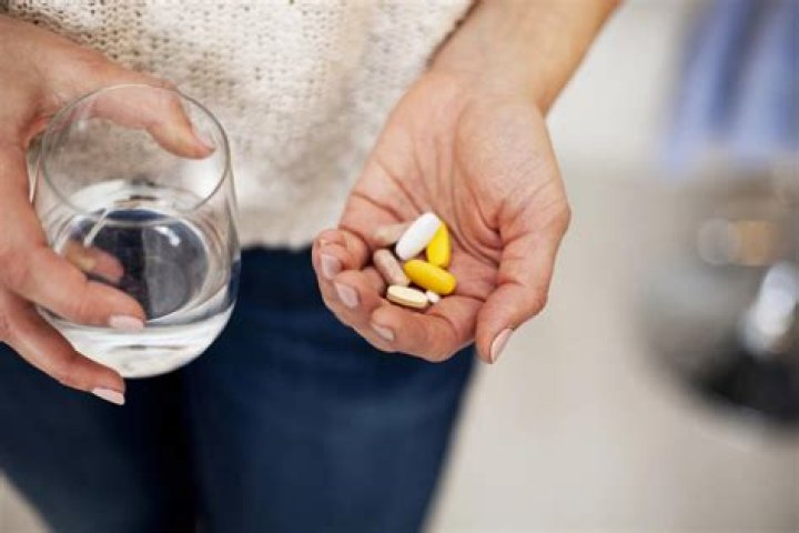 Should multivitamins be taken with food?