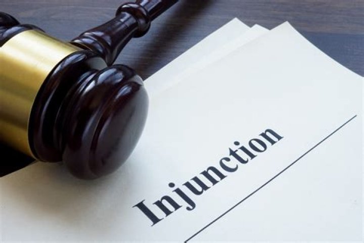 What does it mean to stay an injunction?