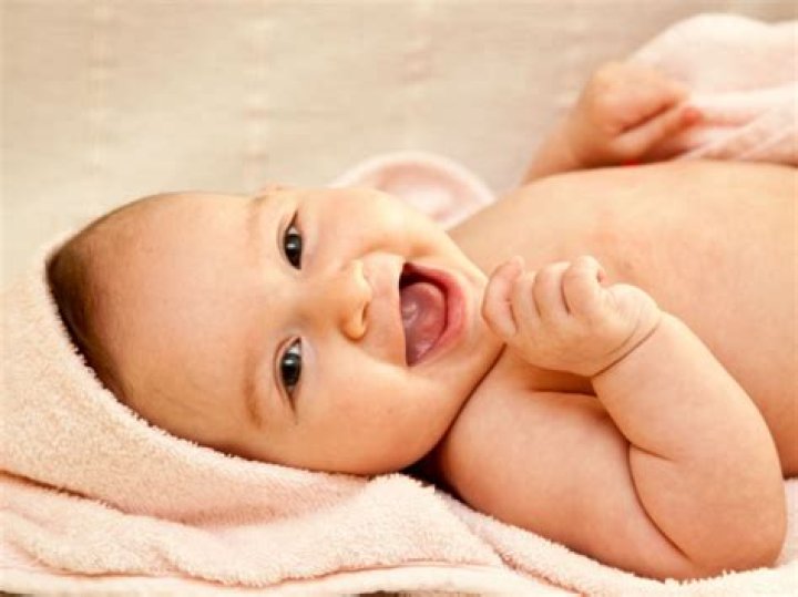 When do babies start smiling at you?