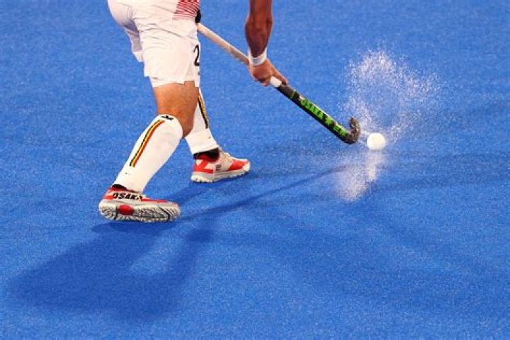 Why are hockey fields wet?