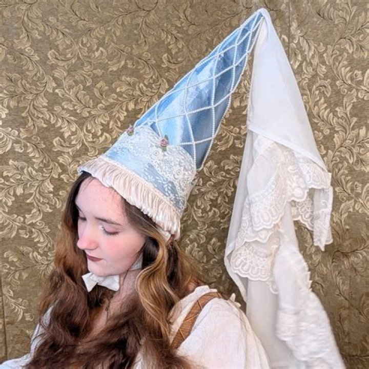 Why do wizards wear pointy hats?