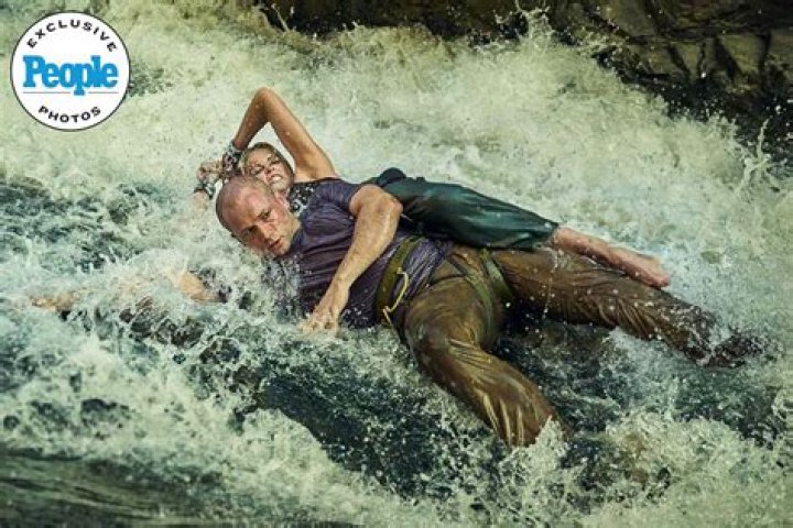 Why does charlize theron sound american?