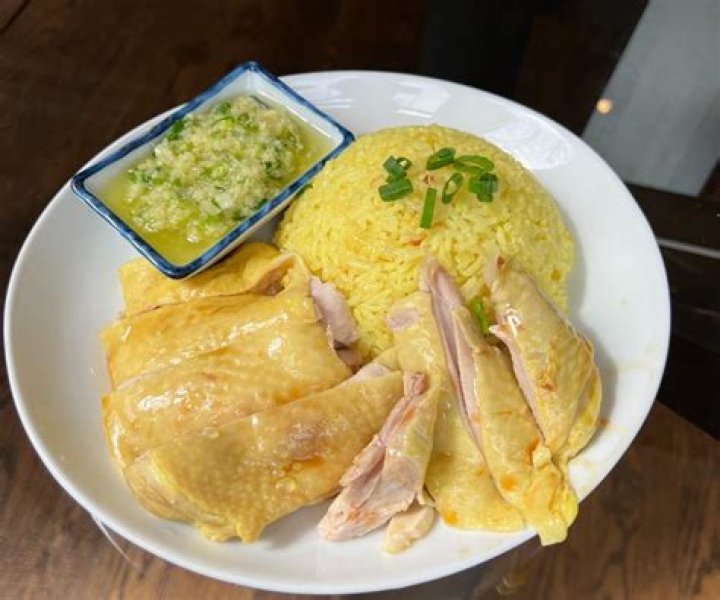 Why is hainanese chicken yellow?